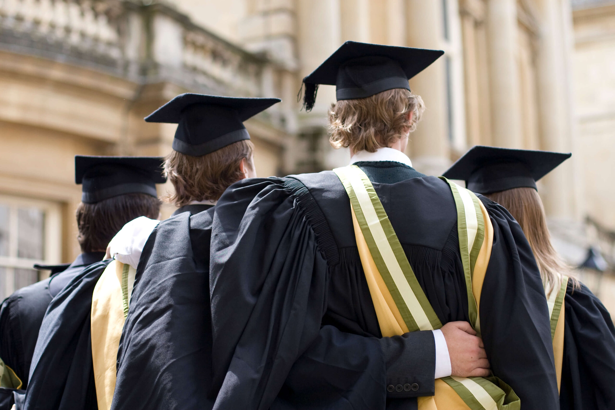 Young people in caps and gowns