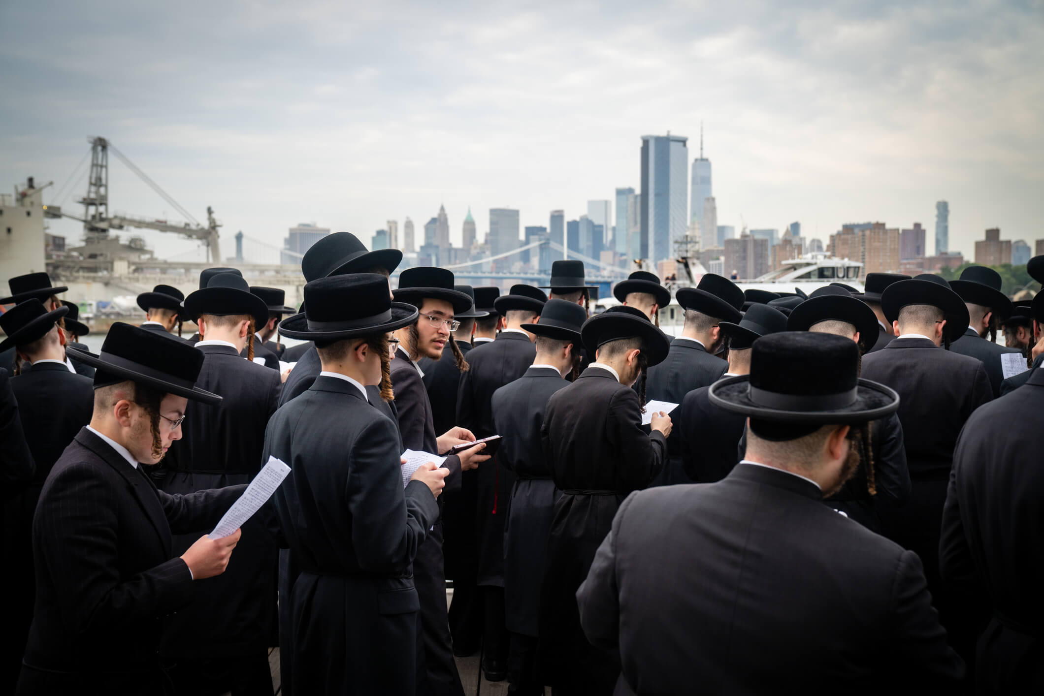 Hasidic Jews from the Williamsburg neighborhood of Brooklyn, New York, gather for the tashlich New Year’s ceremony at the shore of the East River, September 24, 2020 (Wirestock/Getty Images)