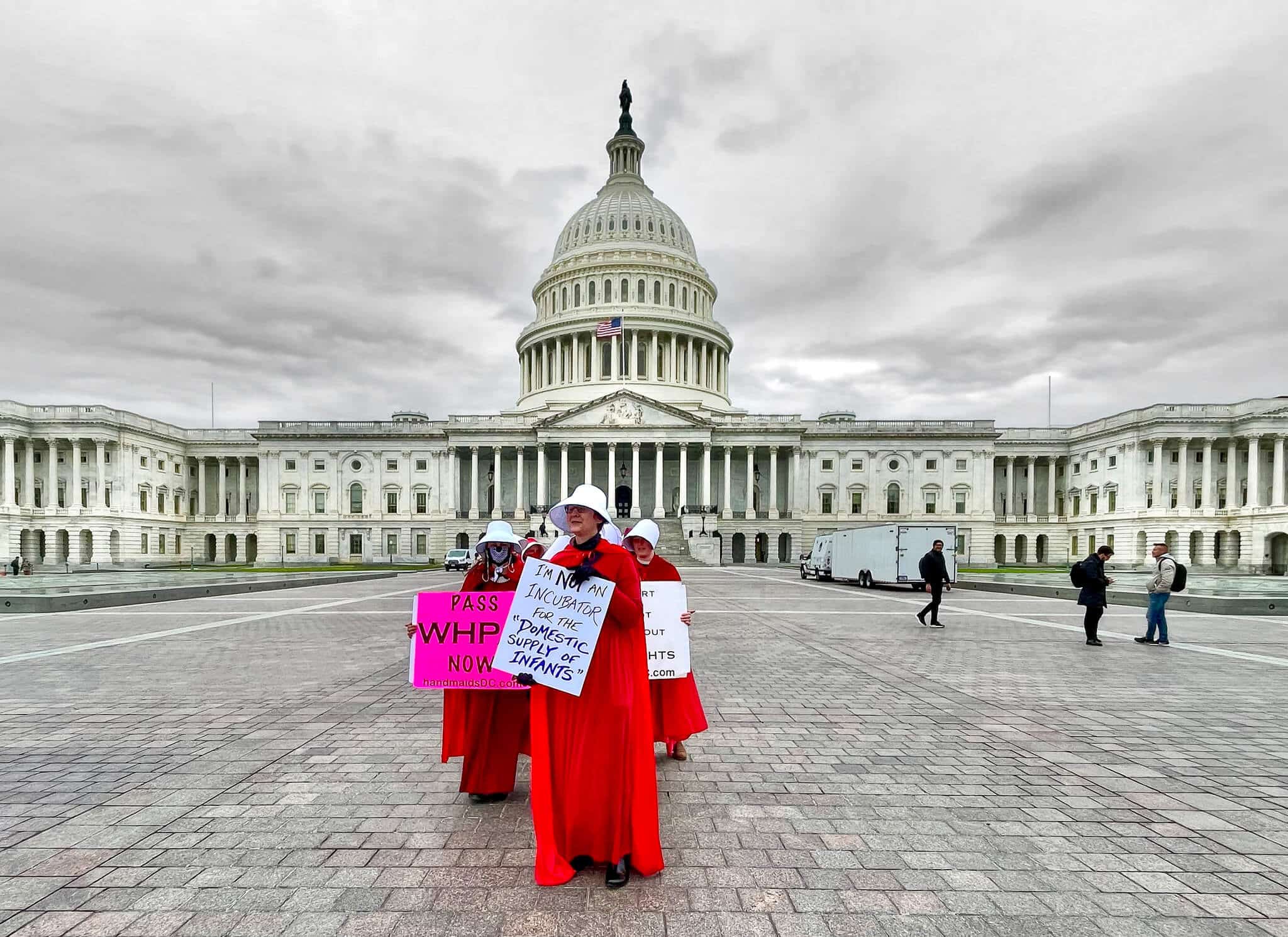“Handmaids” at the U.S. Capitol protesting in support of abortion rights (Miki Jourdan/Flickr/CC BY-NC-ND 2.0 DEED license)