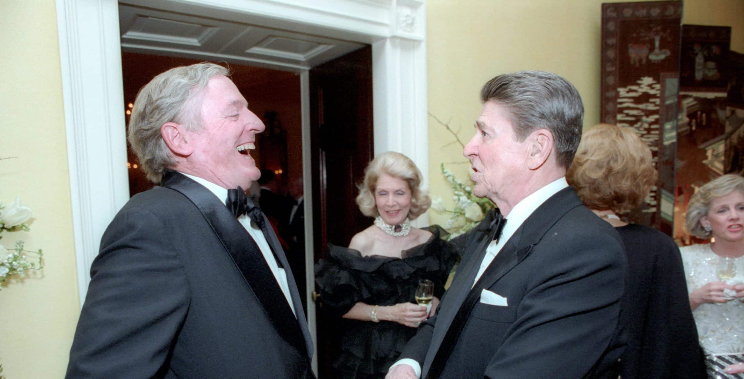 William F. Buckley Jr. and President Ronald Reagan at Reagan’s seventy-fifth birthday party, February 7, 1986 (Reagan White House Photographs / Wikimedia Commons)