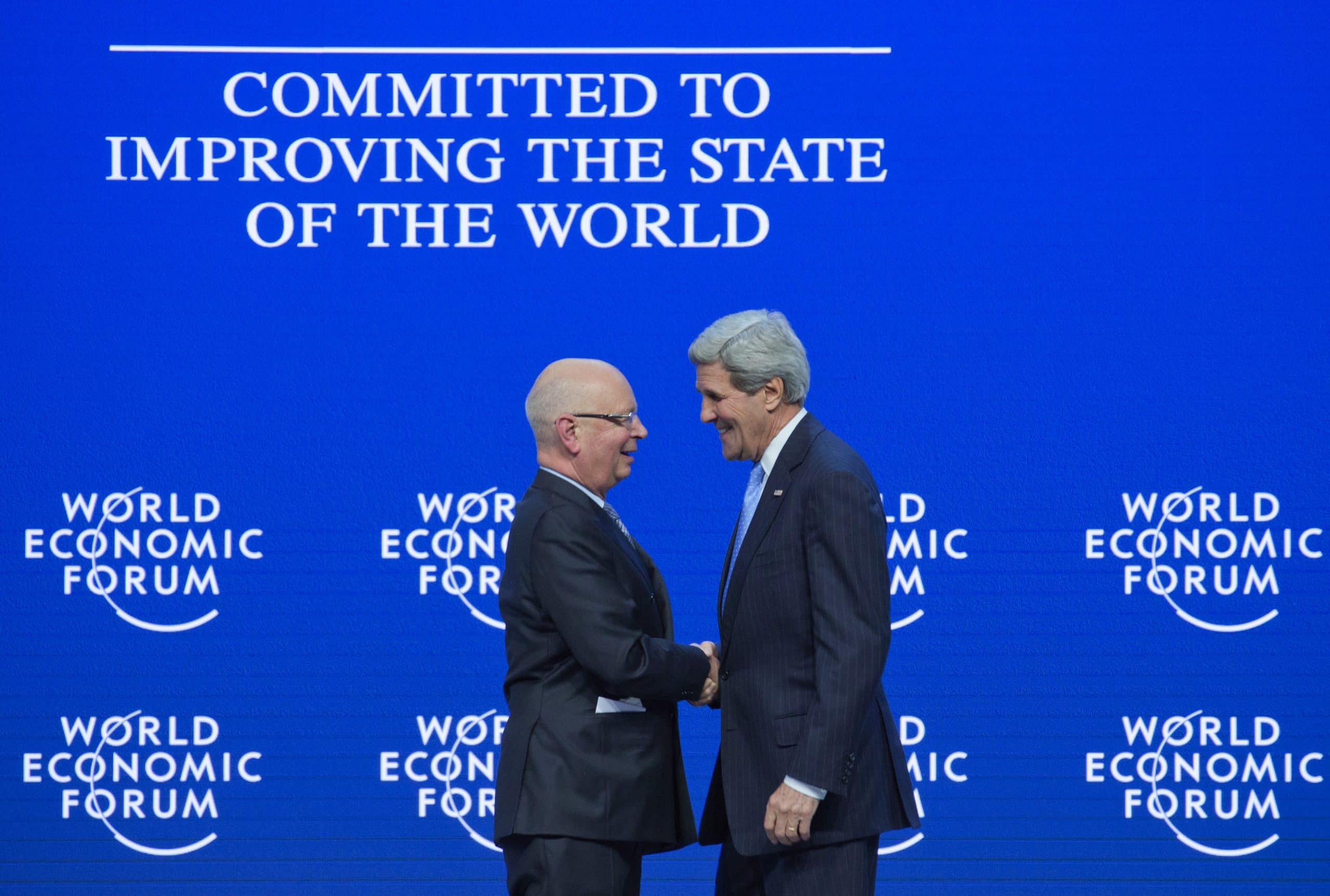 Klaus Schwab and John Kerry at the 2015 World Economic Forum in Davos, Switzerland (U.S. Embassy Bern/Eric Bridiers/Wikimedia Commons)