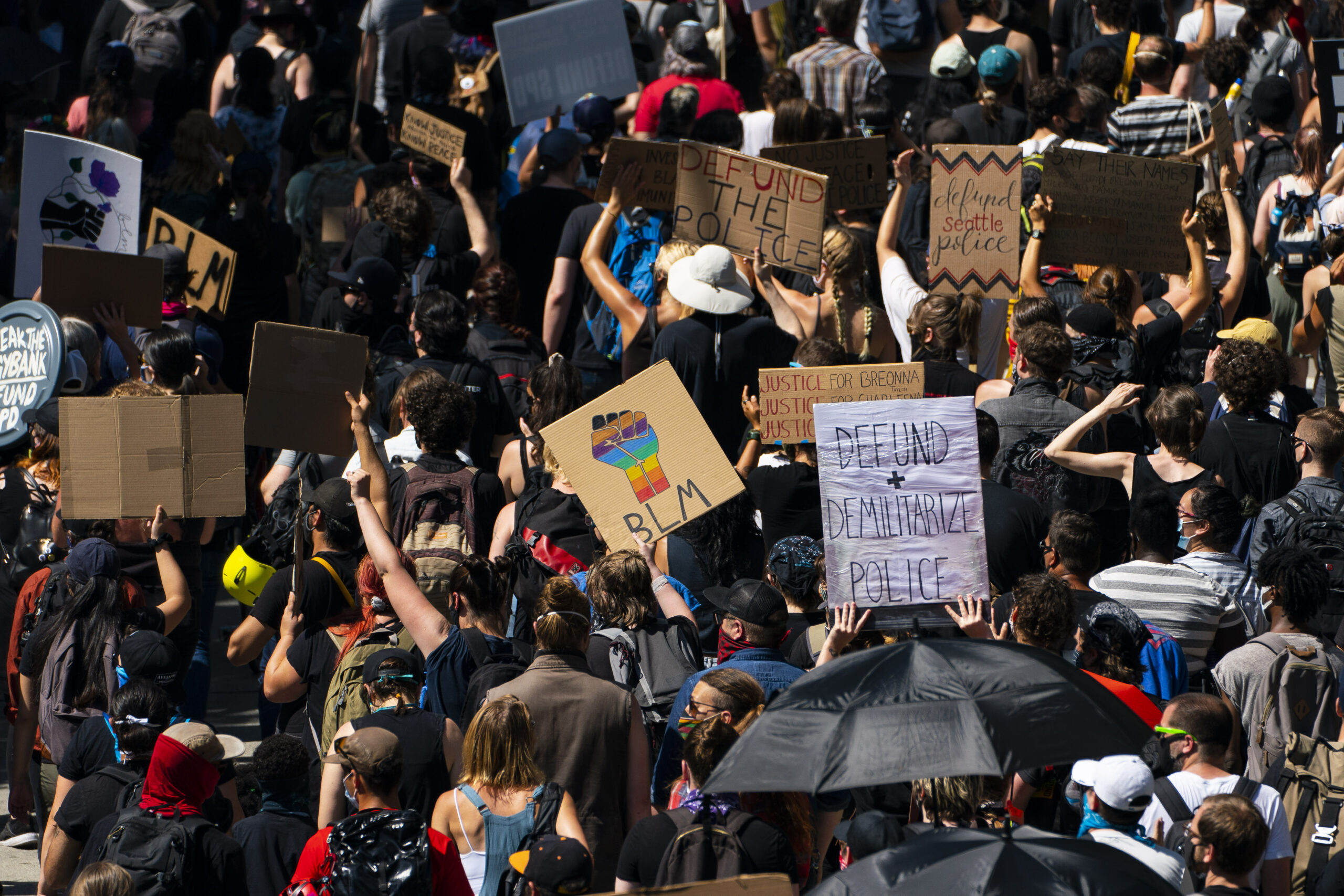 Protesters march to City Hall in support of defunding police on August 5, 2020 in Seattle, Washington (David Ryder/Stringer via Getty Images).