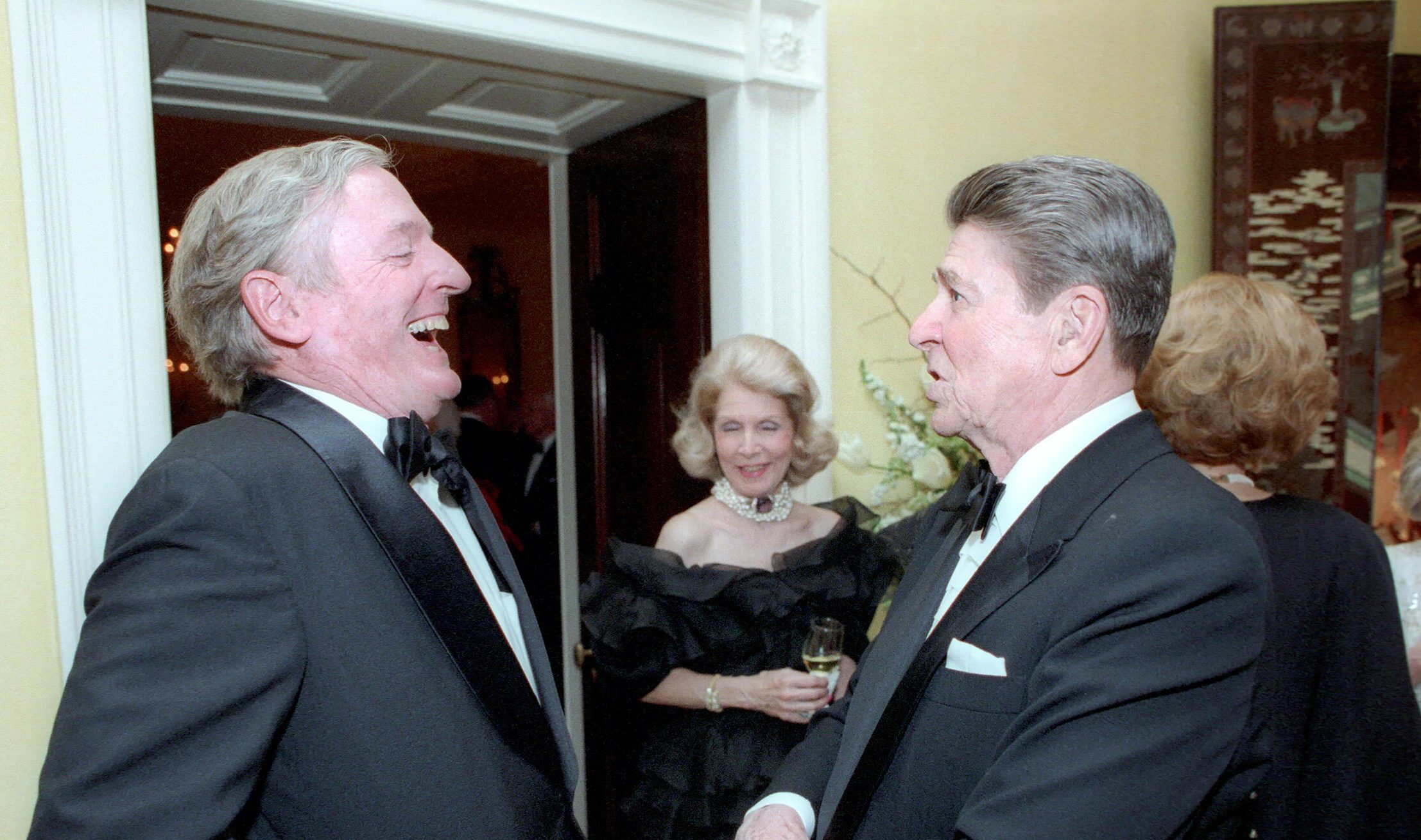 President Reagan with William F. Buckley Jr. in the White House Residence in honor of President Reagan's 75th Birthday (Wikimedia Commons/CC0 1.0 DEED license)