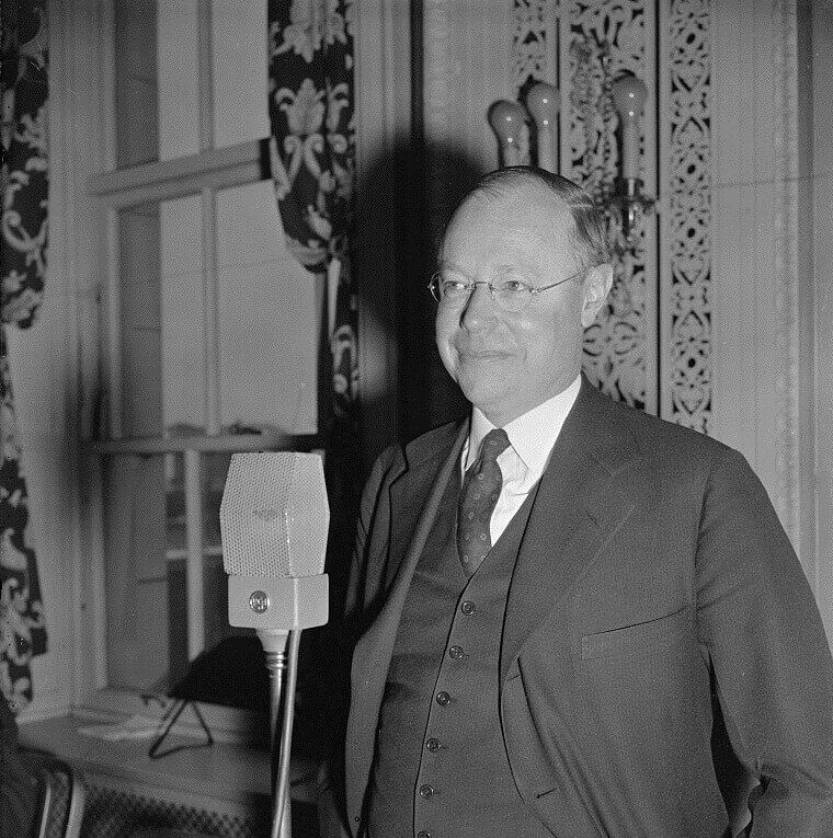 Man in black and white with microphone