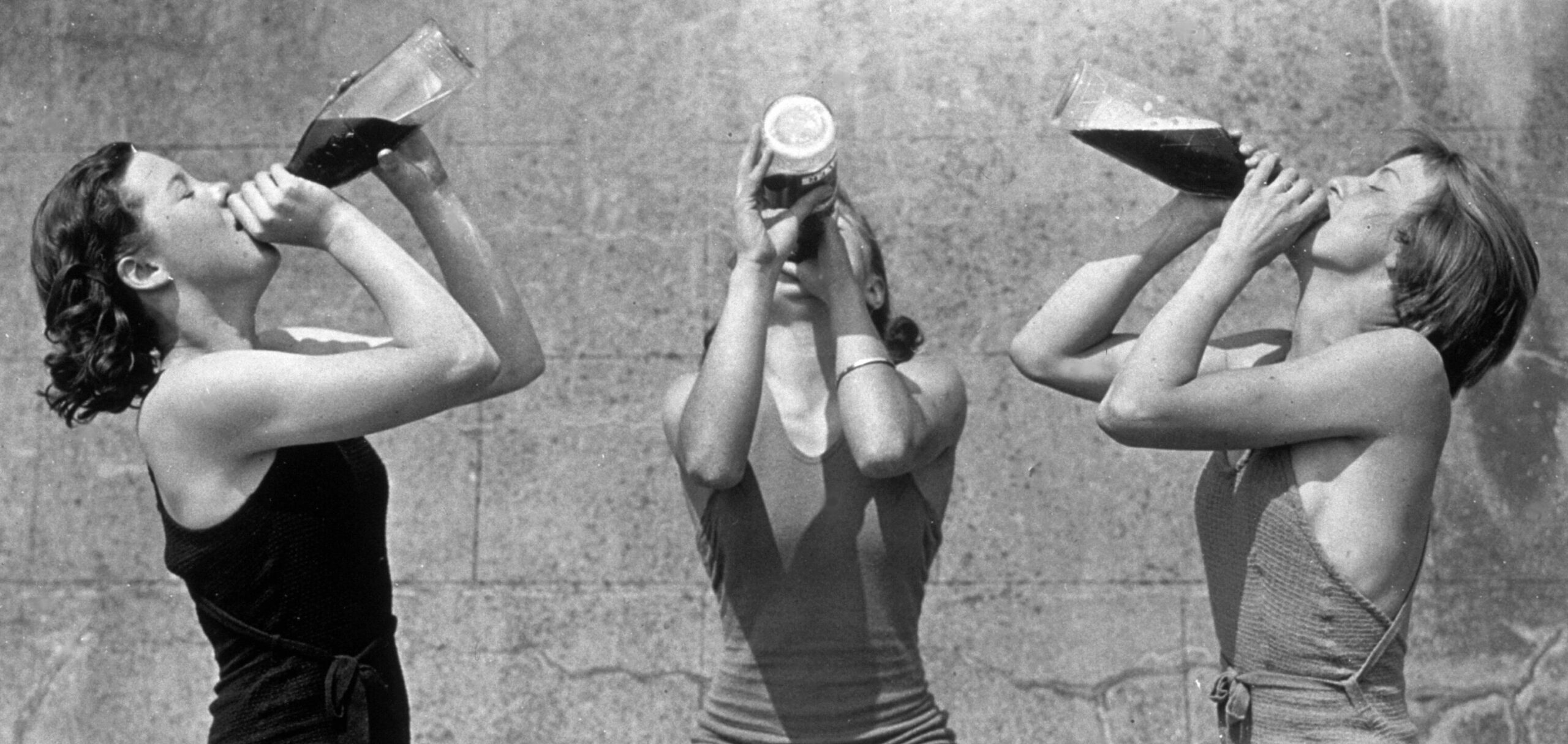 Women drinking on the beach